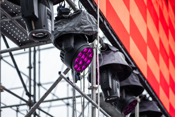 stage lighting setup and led screen installation for live event, concert lights rigs and digital...