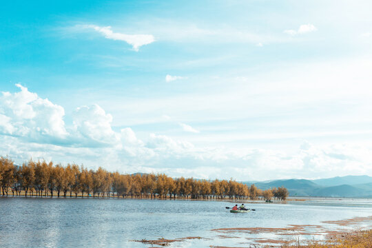 Serene view of Qinglong River in Shuhe with blue sky and white clouds