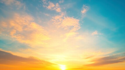 Fototapeta premium Golden Sunrise Sky with Fluffy Clouds at Dawn Peaceful Morning View