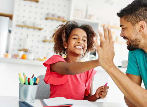 father child home family homework daughter teenage parent education teamwork high five teen girl kid teaching happy learning together school - Powered by Adobe