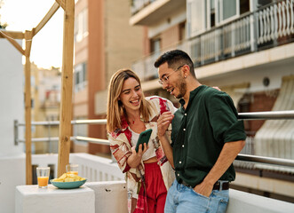 woman selfie phone man couple camera mobile phone portrait smartphone happy young romance together love photo picture outdoors outside lifestyle rooftop party summer fun