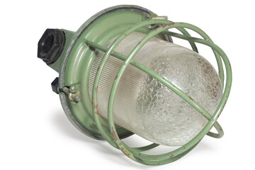 industrial explosion proof pendant lamp light. green metal cage, rusty, over domed clear ribbed glass lamp lid, black plastic bushing for power cord. isolated on white background