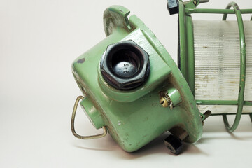 vintage pendant professional lamp light. industrial mine lamp. robust housing, domed cover of cage and thick glass cover, metal triangle hanger ring, plastic cable bushing. closeup