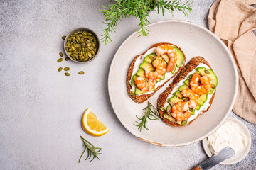 Healthy shrimp sandwiches for breakfast, snack, appetizers Toast with grilled prawns and whole...