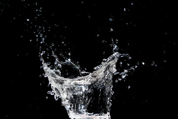 Dynamic Splash of Water Against Black Background Capturing Motion and Energy in High-Speed Photography