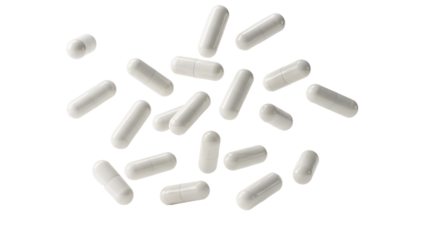 Falling white medicine pills capsule isolated on white background