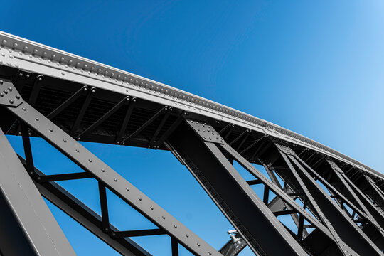 Steel bridge over blue sky for architecture background presentations
