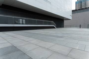 empty concrete ground in front of modern office buildings in downtown. floor for copy space