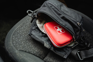 A wellstocked first aid kit can be conveniently found in the back seat of the car, always prepared...