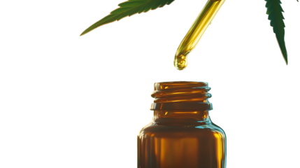 Close-up of a medicinal oil drop falling into a bottle, beside a cannabis leaf. Ideal for illustrating alternative medicine, health and wellness, and natural remedies.