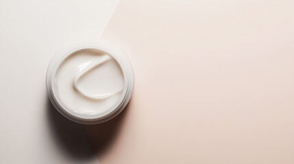 Luxury skincare cream in a sleek container against a soft, warm background perfect for cosmetic presentations or beauty tutorials