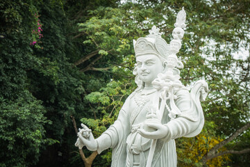 A Serene Buddha Statue Enveloped by Lush, Peaceful Nature and Tranquil Environment Marble...