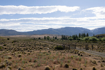 A private property with a fence and gate in the Patagonian steppe region of Argentina