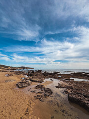 Beach at low tide on a windy day