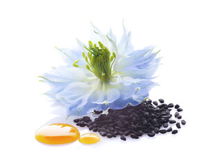 Black cumin seeds with nigella sativa flower on white background