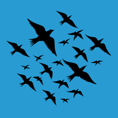 Silhouette illustration of a flock of birds flying in the sky