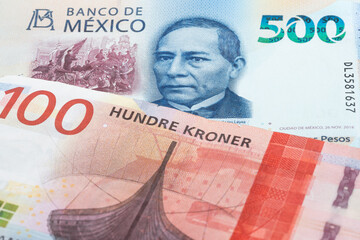 500 Mexican peso and 100 Norwegian kroner banknotes. International trade concept
