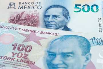 500 Mexican peso and 100 Turkish lira banknotes. International trade concept