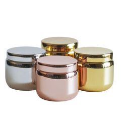 Stylish metallic jars with rose gold, silver, and gold lids on white background
