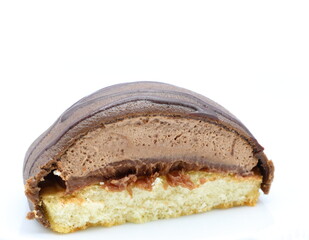Swedish chocolate pastry called biskvi. Cut in half. Close up and isolated with a white background.