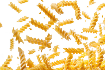 Scattered rotini pasta pieces isolated on transparent background