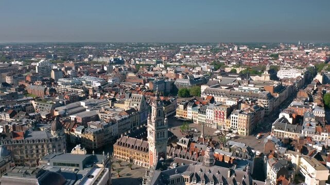 Cityscape of Lille (Hauts-de-france, Flanders, France) at sunset: Aerial skyline view of the historical Grand Place du G&eacute;n&eacute;ral-de-Gaulle, old town main square. 