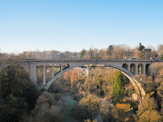 Fototapeta premium Adolphe Bridge (Pont Adolphe) across the Pétrusse river as seen from the Constitution Square (Place de la Constitution) during a winter season in Luxembourg City