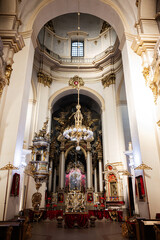 St. George's Cathedral. Lavishly decorated baroque church interior with golden accents and ornate...