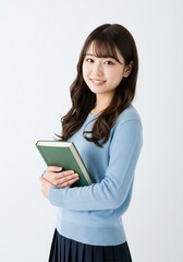 Fototapeta premium beautiful young woman asian student holding book standing straight