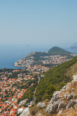 Experience the breathtaking aerial view of a beautiful coastal town and its ocean landscape