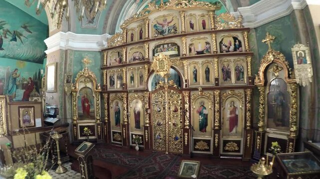 Altar and wall painting in the interior of Orthodox Christian church in Ukraine 