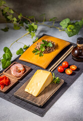 Soba noodles, cheese, shrimp and cherry tomatoes creating a fusion cuisine delight
