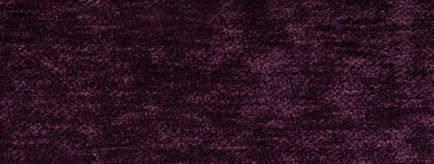 Texture of velvet dark purple background from soft upholstery textile material, macro. Abstract velour wine fabric