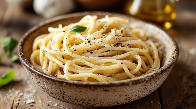 Delicious creamy spaghetti cacio e pepe with parmesan and black pepper