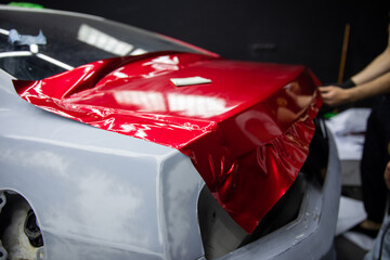 Process of Red Car Vinyl Wrapping