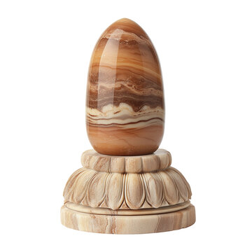 Traditional stone lingam with intricate base isolated on white background