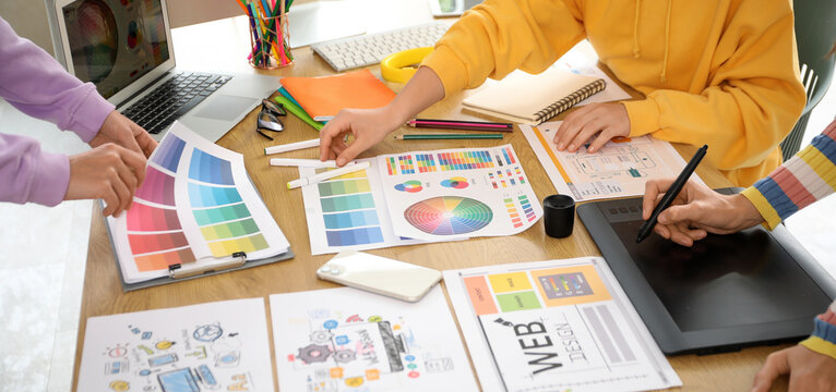 Female graphic designer working in office