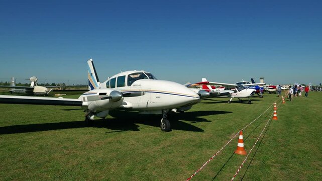 Festival-show of small aviation in Ukraine. Light and ultralight aircraft planes and spectators on the airfield