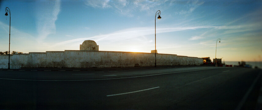 Panoramic view of the road along the coast at sunset in Rabat, Morocco.