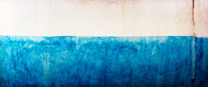 Panoramic view of a blue and white wall in Rabat, Morocco.