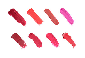 Lipstick swatches in different shades on white background, top view. Set of samples