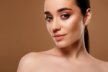 Photo of gorgeous adorable lady naked shoulders evening make up isolated on beige color background