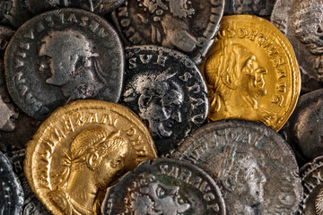 A treasure of Roman gold and silver coins.Trajan Decius. AD 249-251. AV Aureus.Ancient coin of the Roman Empire.Authentic silver denarius, antoninianus,aureus of ancient Rome.Antikvariat.
