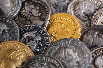 A treasure of Roman gold and silver coins.Trajan Decius. AD 249-251. AV Aureus.Ancient coin of the...