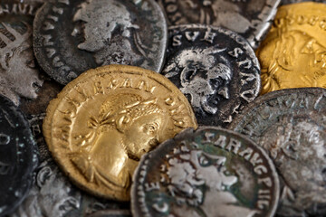 A treasure of Roman gold and silver coins.Trajan Decius. AD 249-251. AV Aureus.Ancient coin of the...