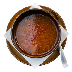 Traditional Slovak vegetable soup was prepared and served in cafe. Soup is made with addition of sauerkraut and pieces of homemade sausage. Isolated over white background