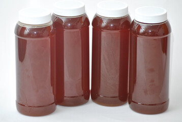 Variety of Containers with Natural Liquids from Mexico (Honey and Others)