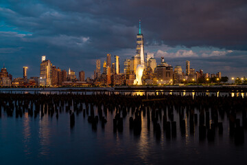 Obraz premium NYC skyline with skyscrapers. Manhattan and Brooklyn. New York City skyline with Hudson River views. Downtown NYC. New York from waterfront skyline. Panorama of of New York.