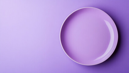 Fototapeta premium Empty lavender plate resting on a soft purple surface, showcasing its smooth shine and delicate color, creating a minimalist and calming aesthetic suitable for various culinary presentations or decora