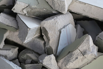 Broken concrete, Piles of lightweight construction bricks after house demolition